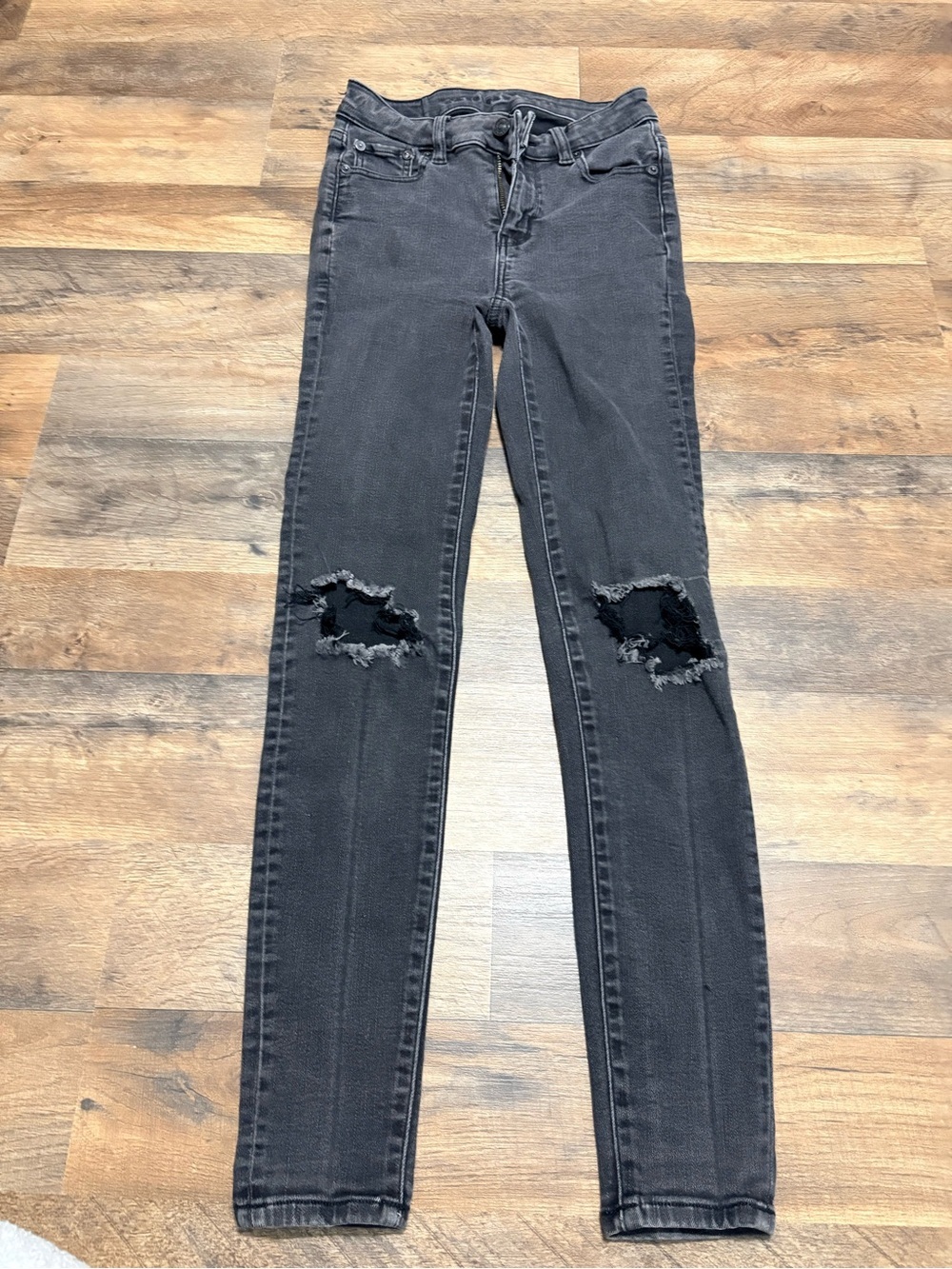 American Eagle Next Level Stretch Black Distressed Jeans Women 0 Regular Skinny